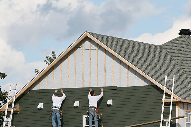 Professional Siding Contractor technician working in Luxor, PA